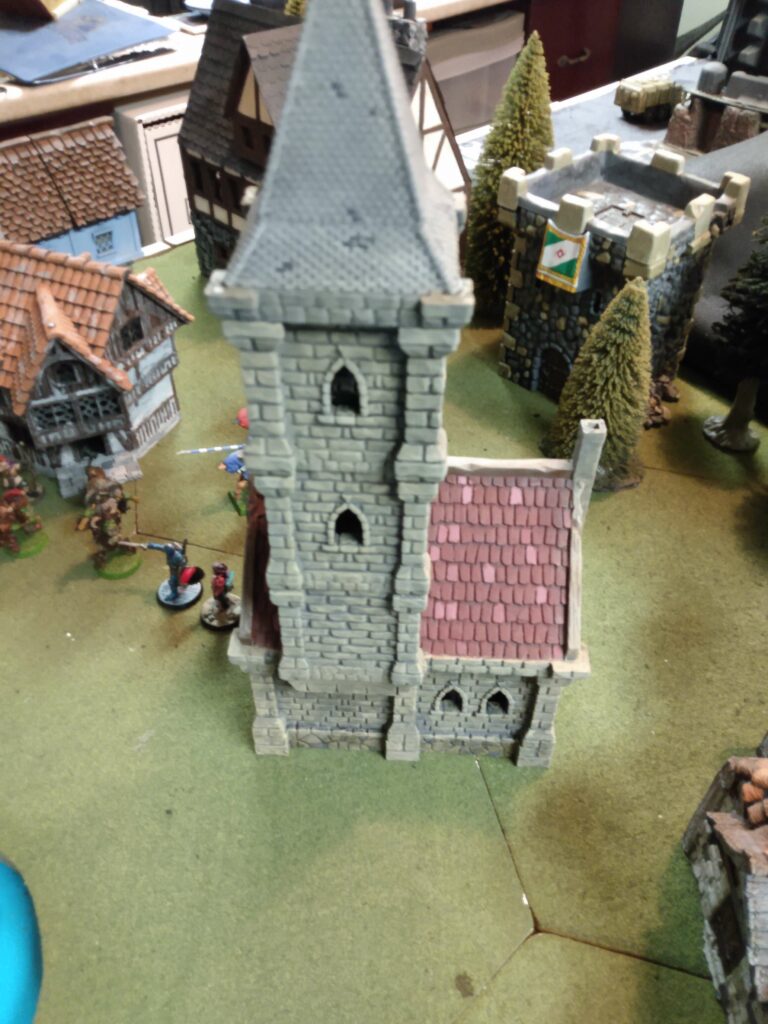 A 3d printed stone chapel for miniature wargames.
