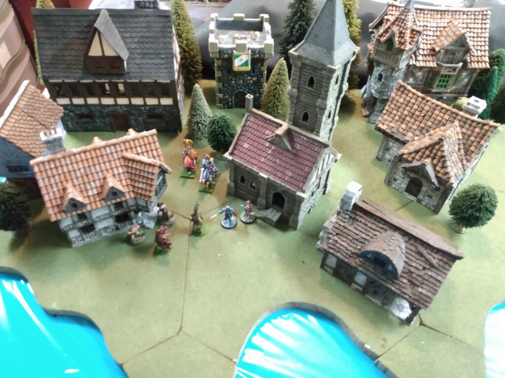 A medieval village for 28mm miniature wargames.