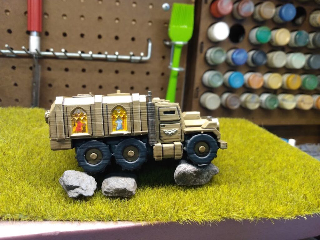 3D printed gothic sci-fi field ambulance with Orthodox icons on the side