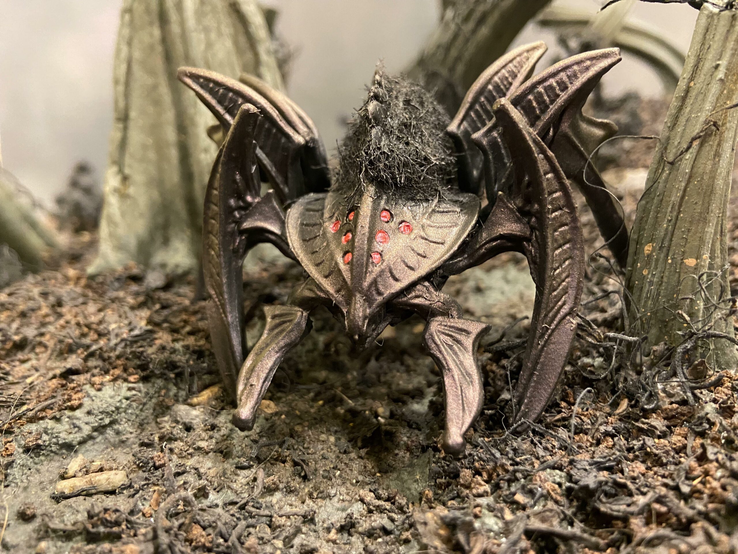 Final Faction toy spider drone customized into a wargaming miniature for Verrotwood