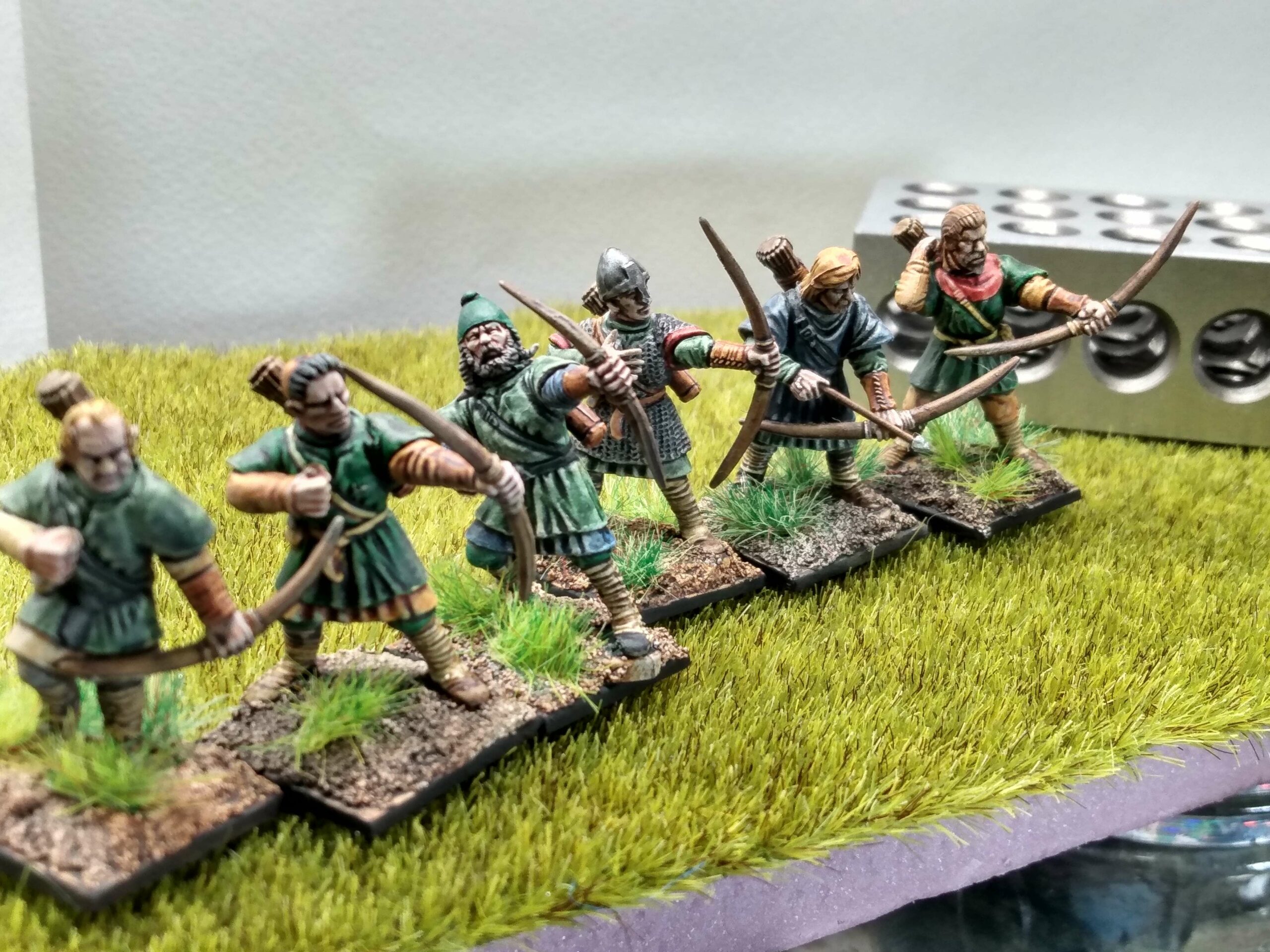 Painted 28mm medieval archers, manufactured by Conquest Games.